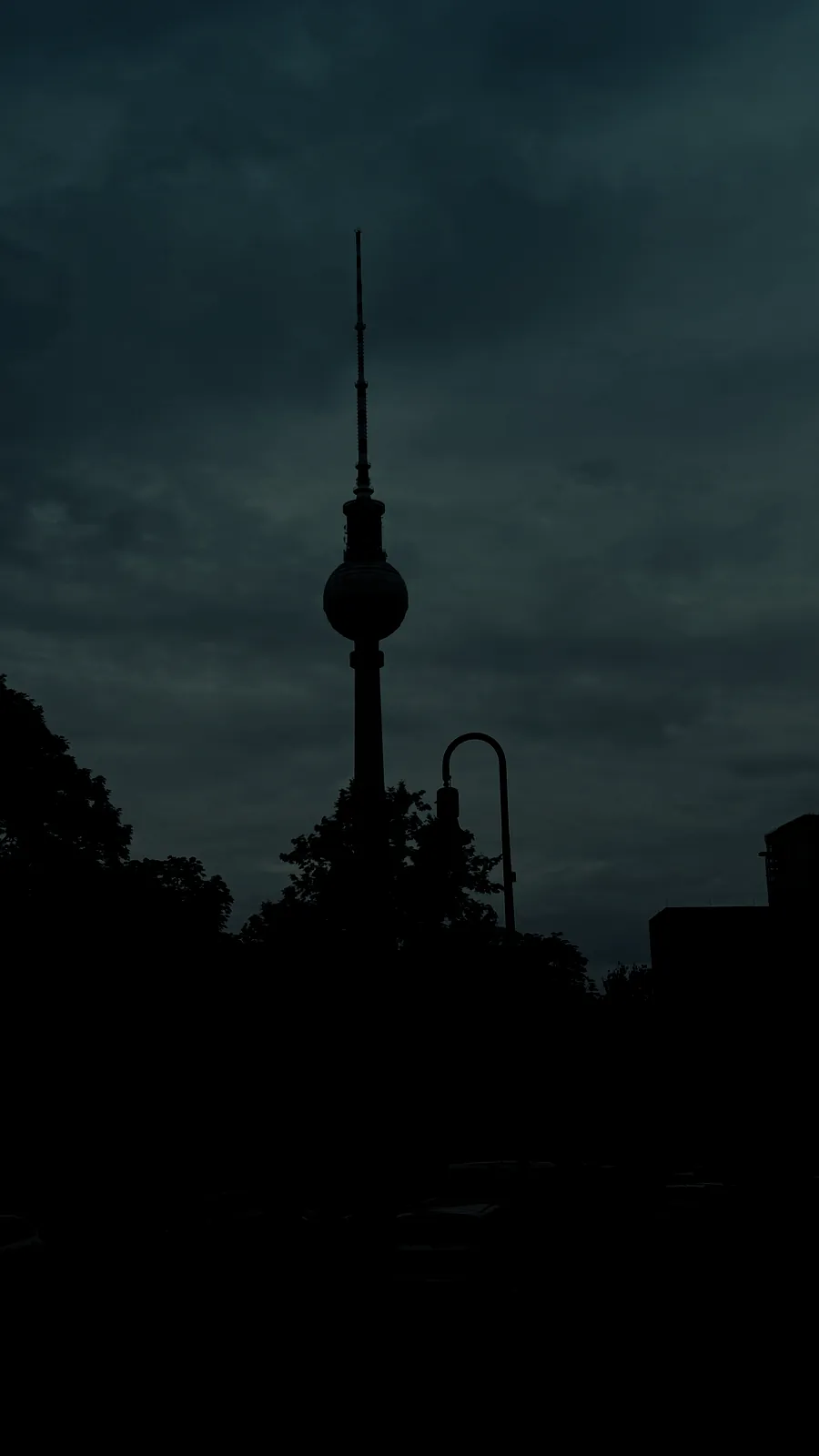 The Fernsehturm under a grey evening sky