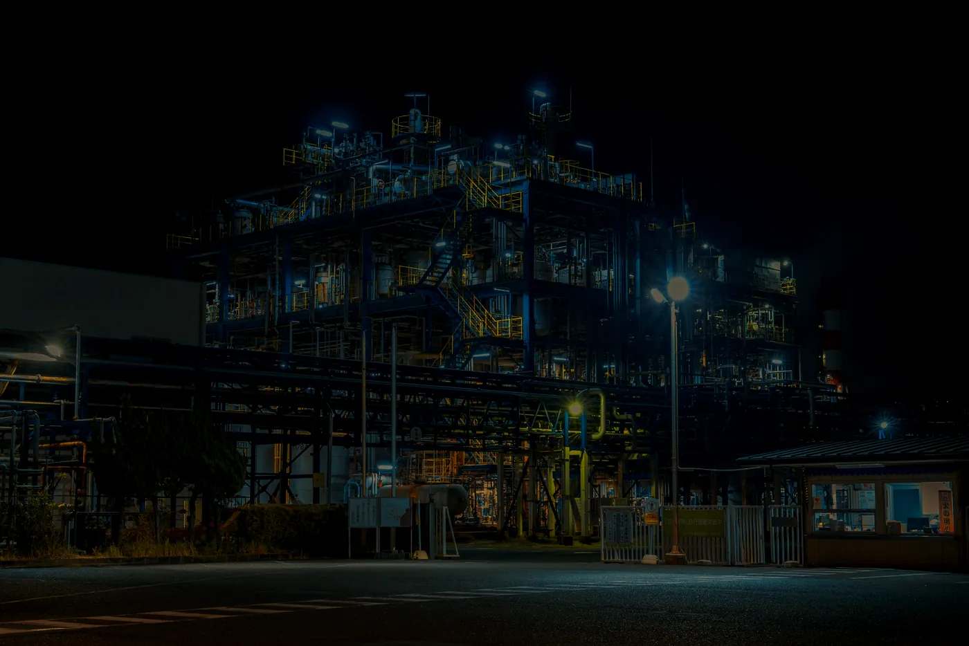 An industrial plant lit up at night